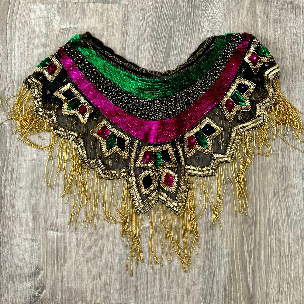 Awesome gold, green and magenta caplet!